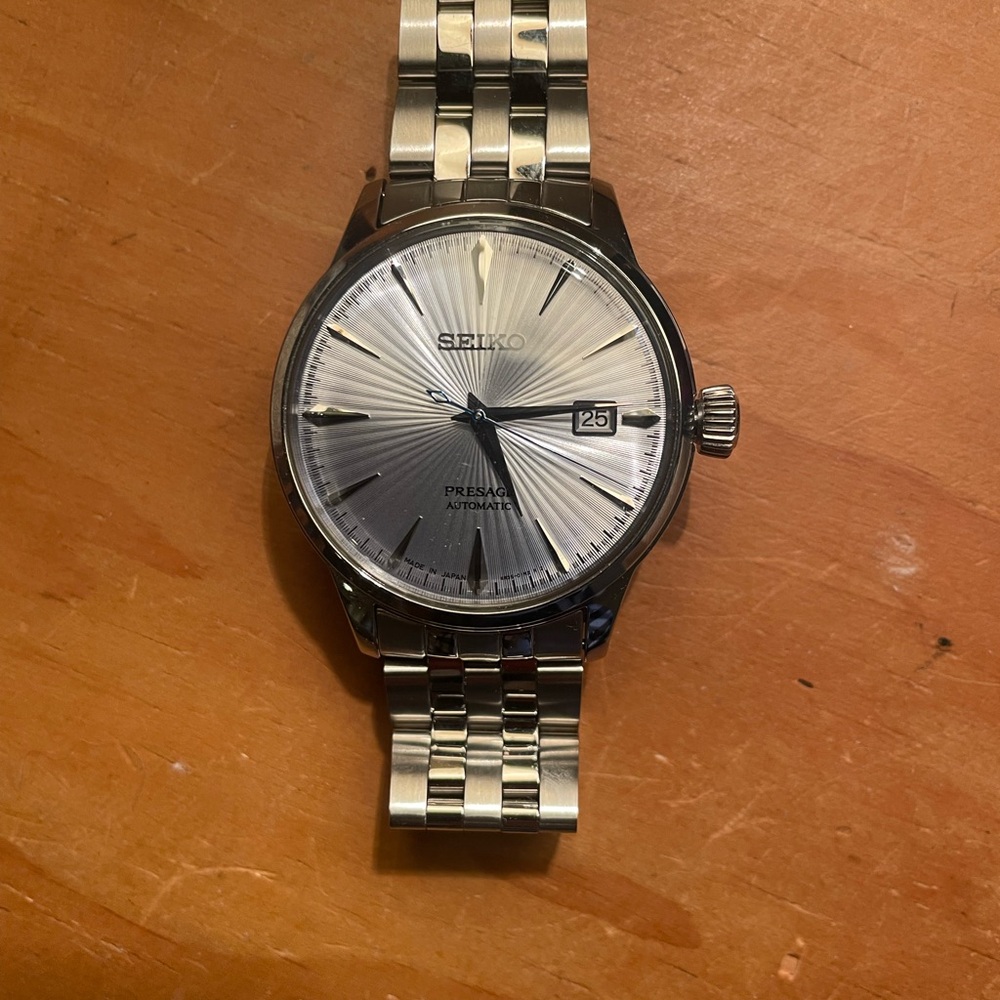 Seiko Men’s Silver Sunburst Dial Stainless Steel Watch